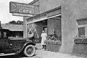 The old Electric Cafe with Anton in standing in front.